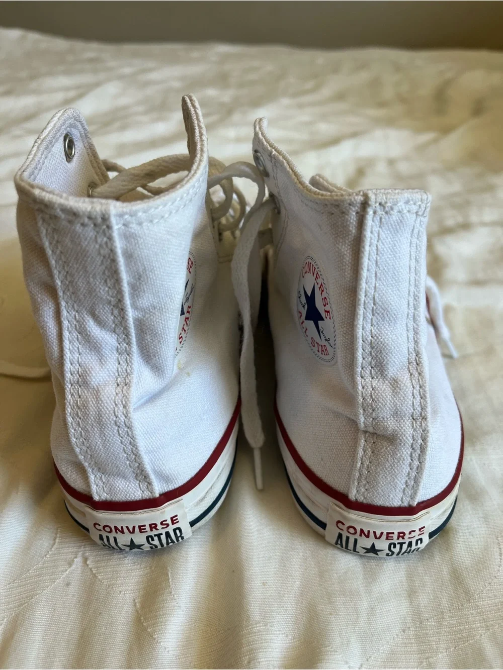 Converse White High Top Sneakers with Red and Blue Stripes